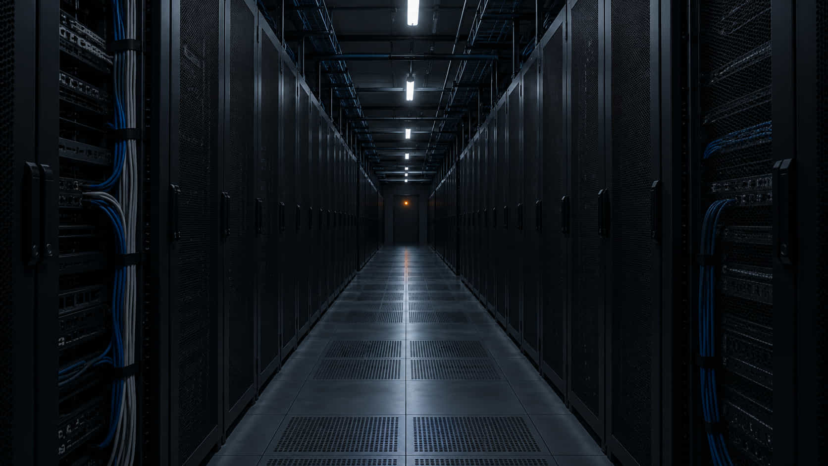 Allée de centre de données plongée dans la pénombre, longues rangées de baies de serveurs dont les voyants sont éteints, illustrant une panne simultanée des services d'intelligence artificielle